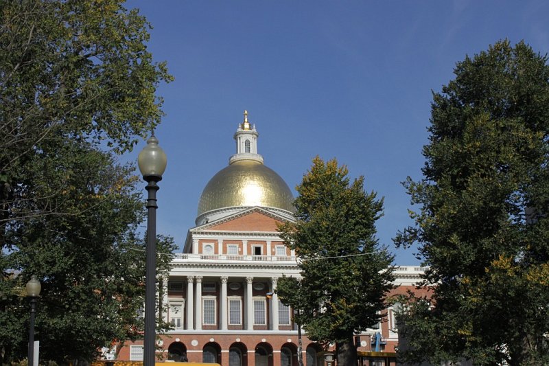 IMG_3633.jpg - State House-On July 4, 1795 the surviving fathers of the Revolution gathered to enshrine the ideals of their new commonwealth in this government building designed by Charles Bulfinch.  Governor Samuel Adams and Paul Revere laid the cornerstone.  During WWII the dome was painted gray so that it would not reflect moonlight during blackouts and therefore be a target to bombers.  It was again gilded in 1997.