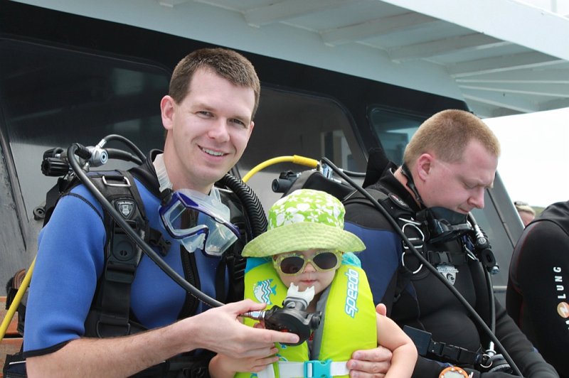 IMG_1486.JPG - Getting used to daddy's "mask."